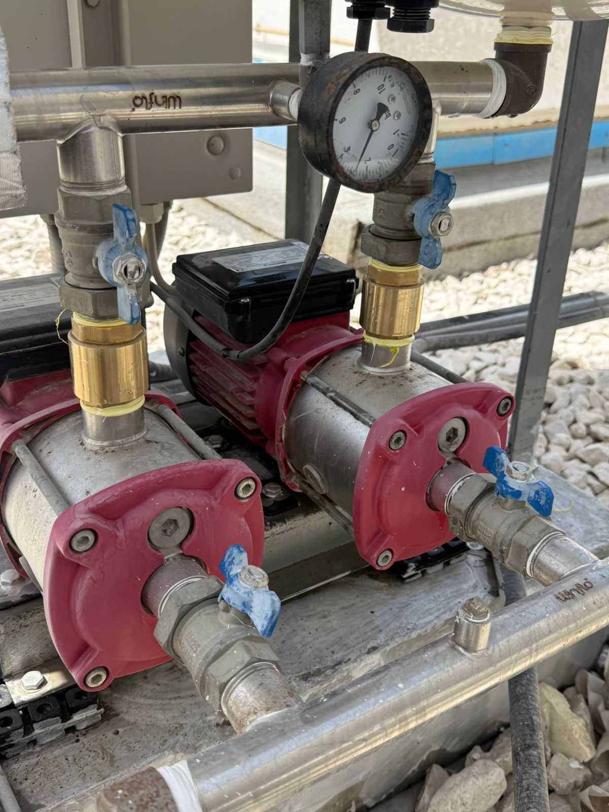 Installed twin horizontal pump system with valves, gauge and pipework